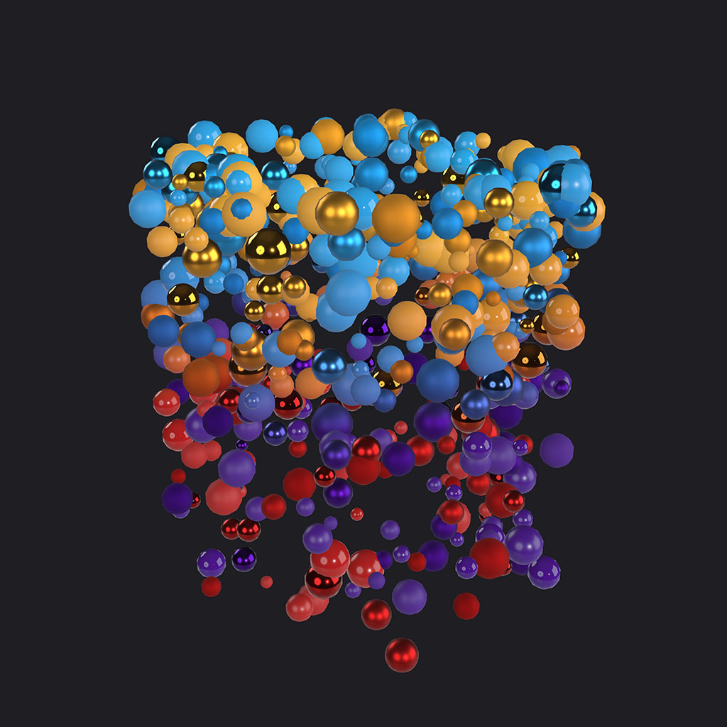 Example of node material on SPS showing a series of spheres emitted into a cylindrical area with varying metallic values, random roughness values and colors that range from blue and yellow-orange at the top to purple and red at the bottom
